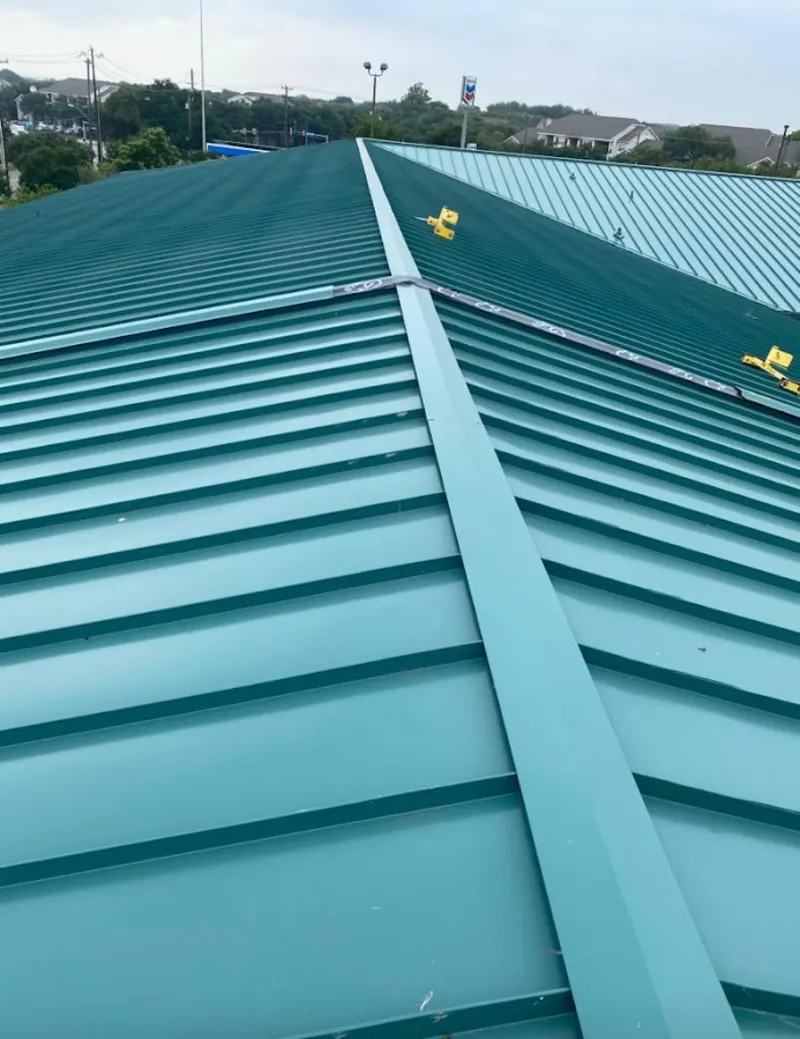 Green commercial metal roof ridge and valley for Metal Roof Repair in La Presa